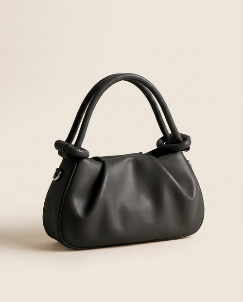 Mini bolso plisado Élan de CASVELO en color Negro