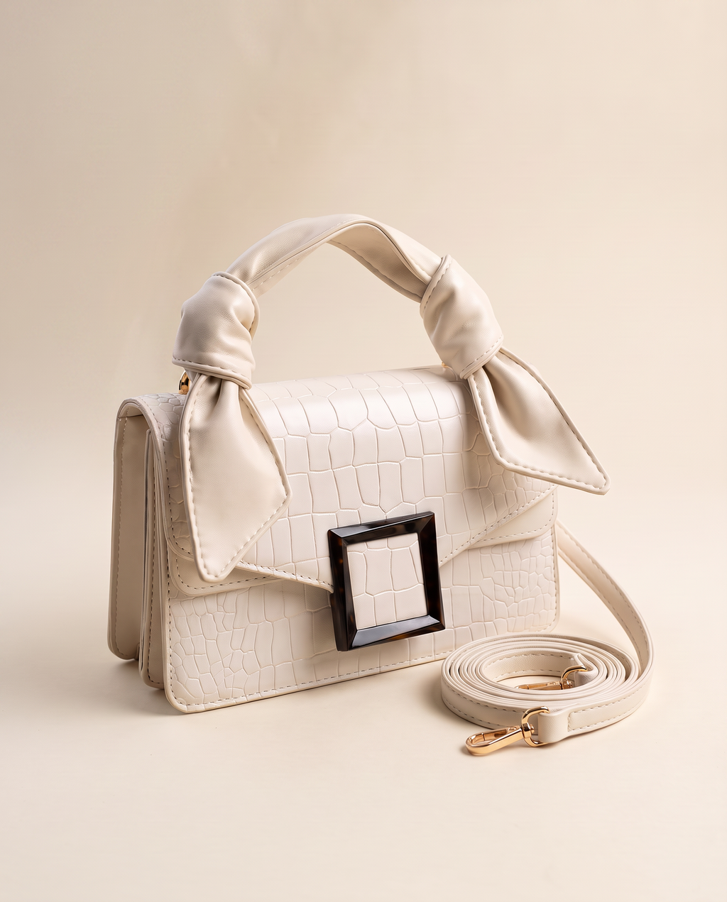 Bolso bandolera Amélie de CASVELO en piel grabada marfil