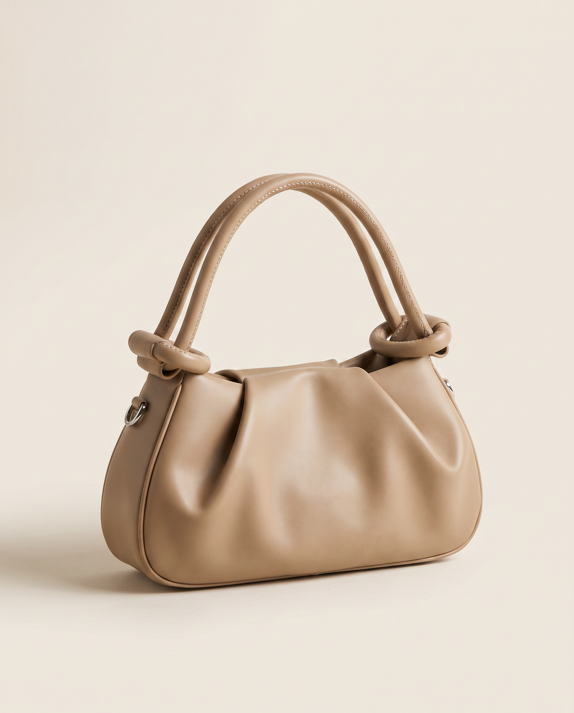 Mini bolso plisado Élan de CASVELO en color arena