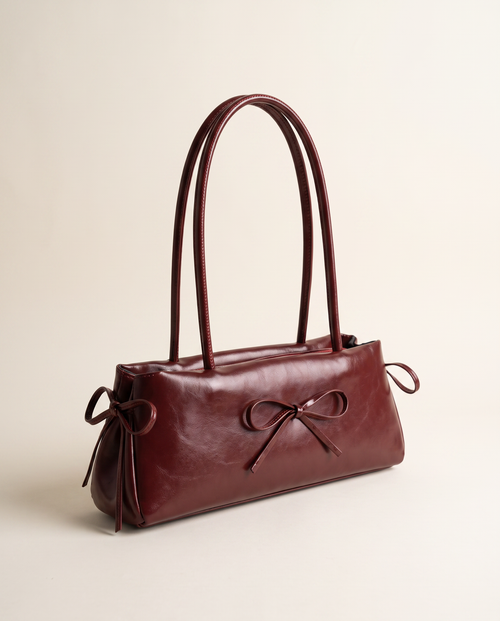 Bolso baguette Luna de CASVELO en piel encerada burdeos