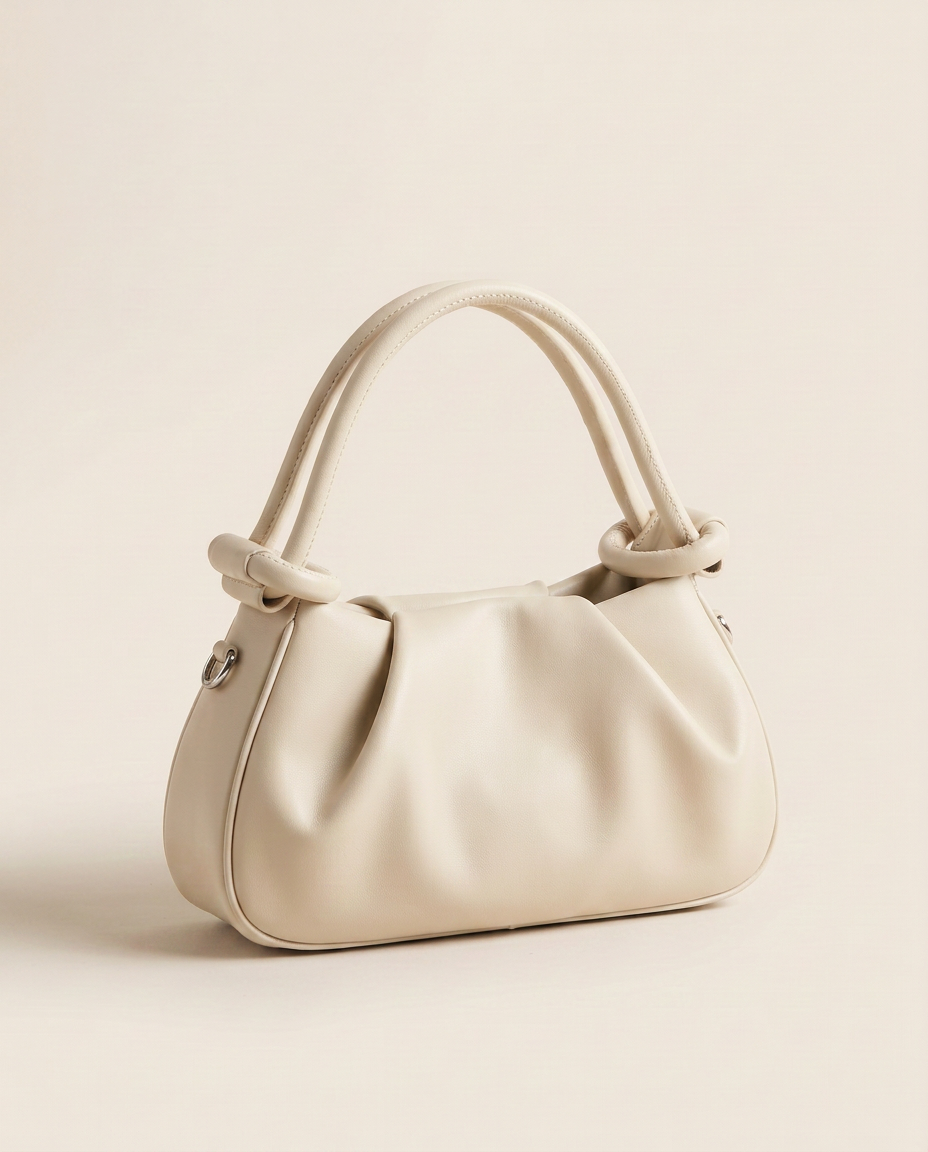 Mini bolso plisado Élan de CASVELO en color Marfil