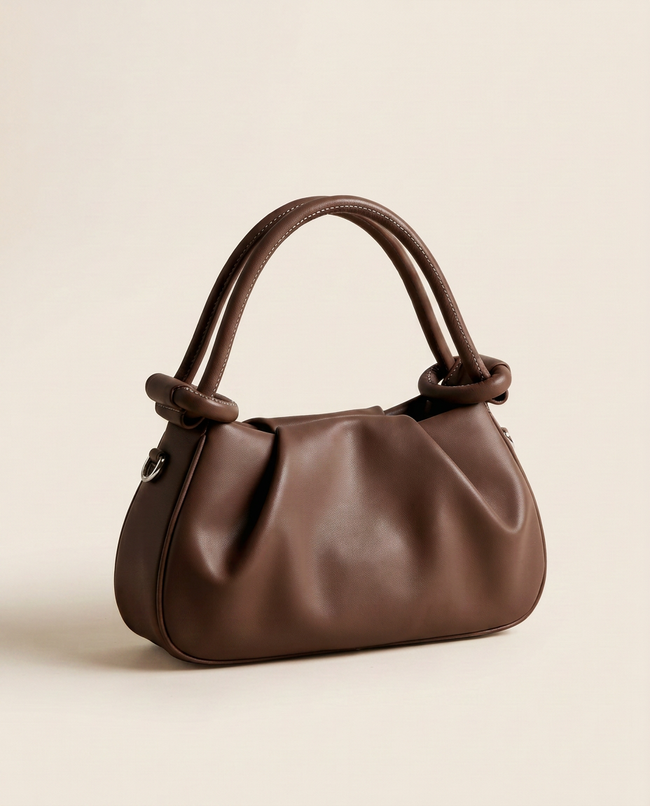 Mini bolso plisado Élan de CASVELO en color Chocolate